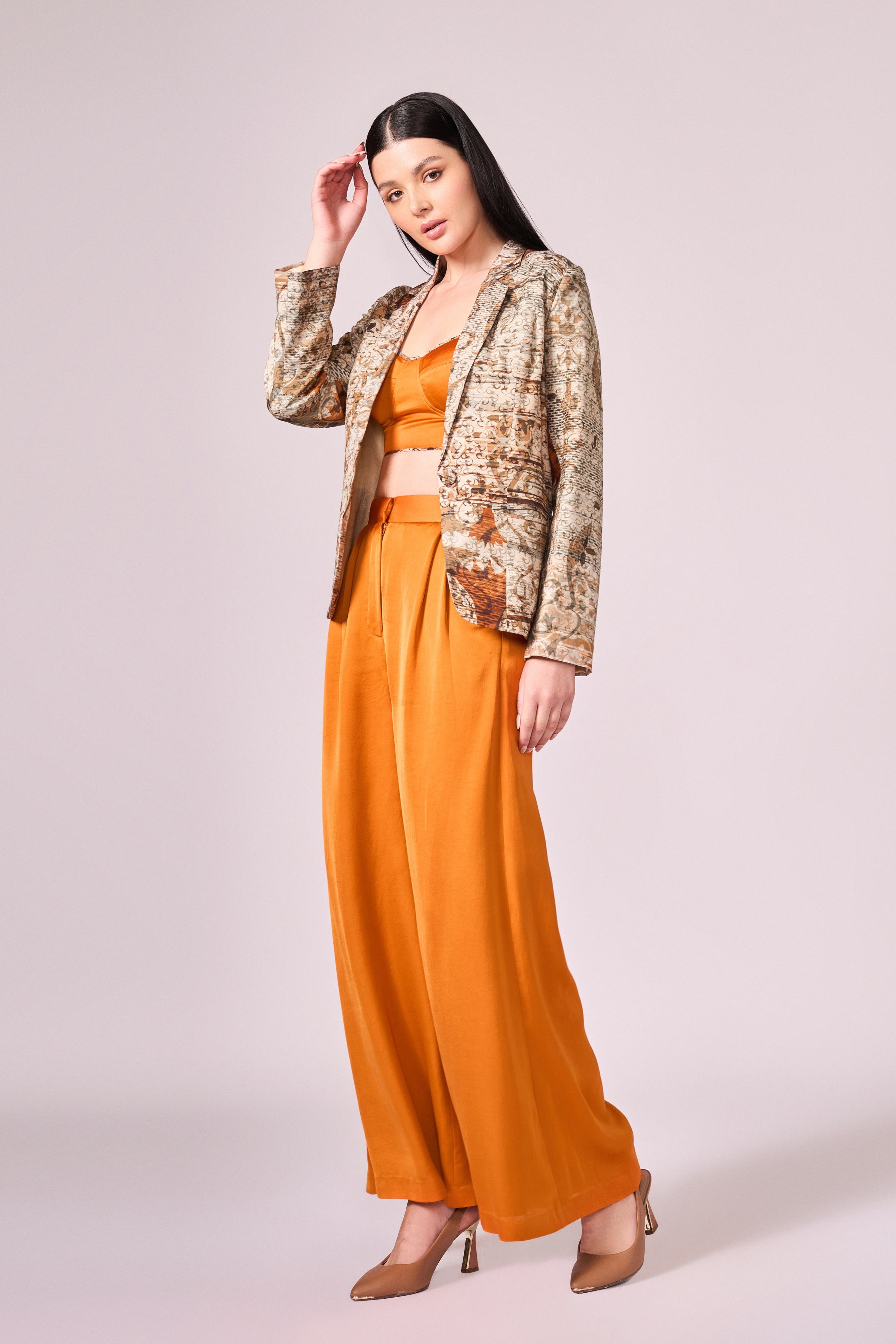 Browns abstract floral print jacket, burnt orange bustier and pant set