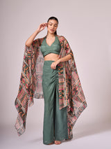 Multi colored geometric print cape, chalk green blouse and skirt set