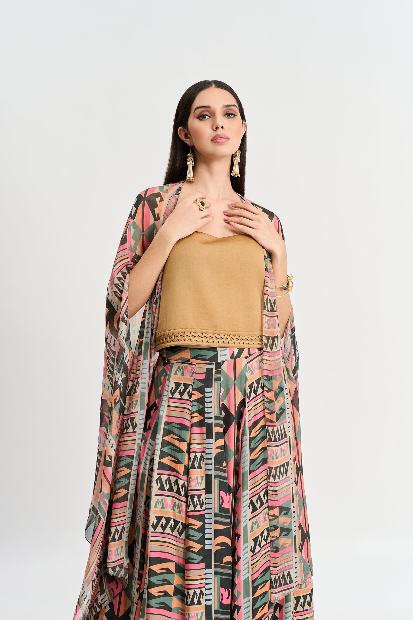 Multi coloured geometricprint cape