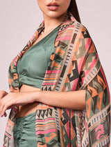 Multi coloured geometricprint cape