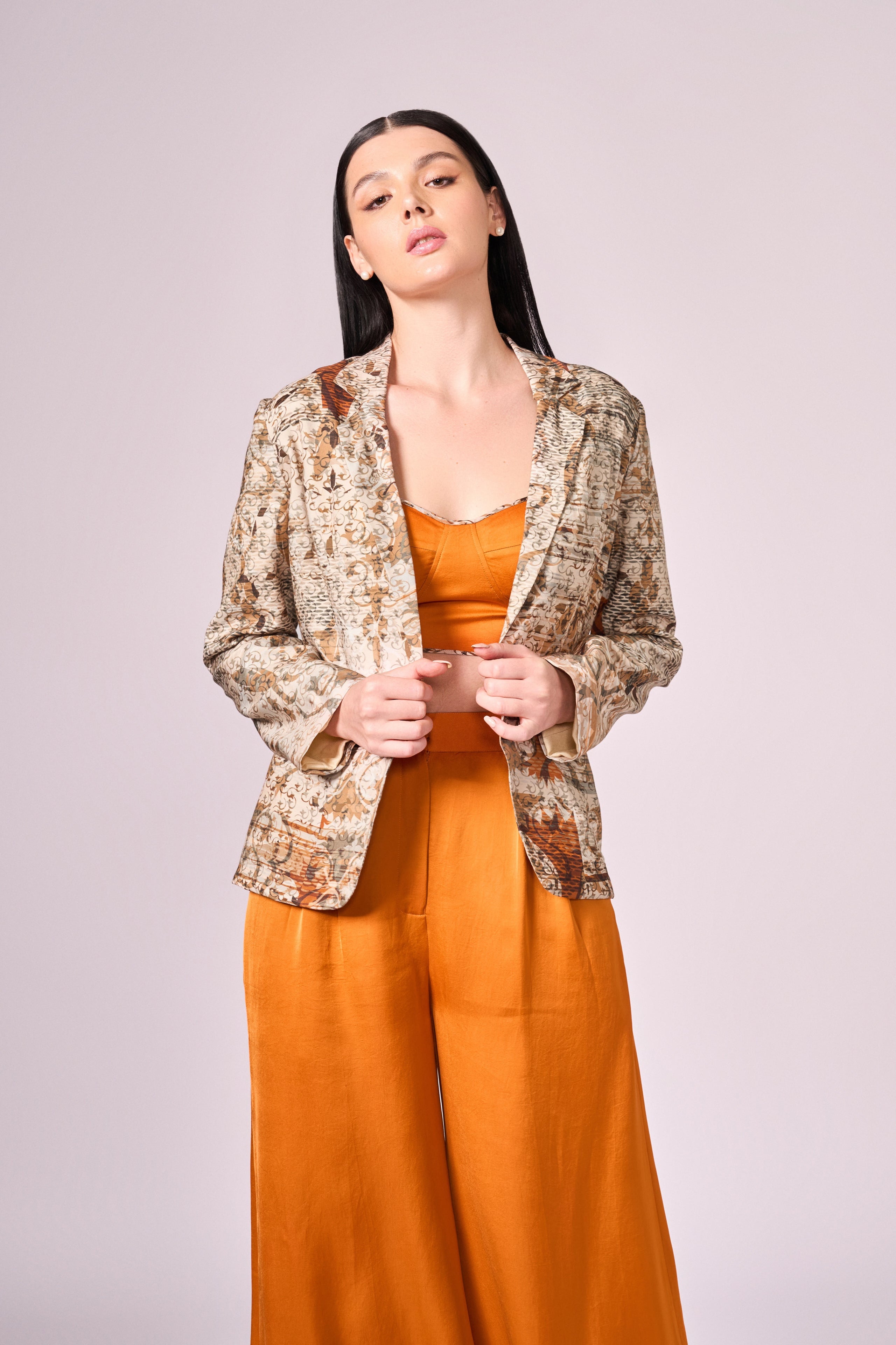 Browns abstract floral print jacket, burnt orange bustier and pant set
