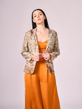 Browns abstract floral print jacket, burnt orange bustier and pant set