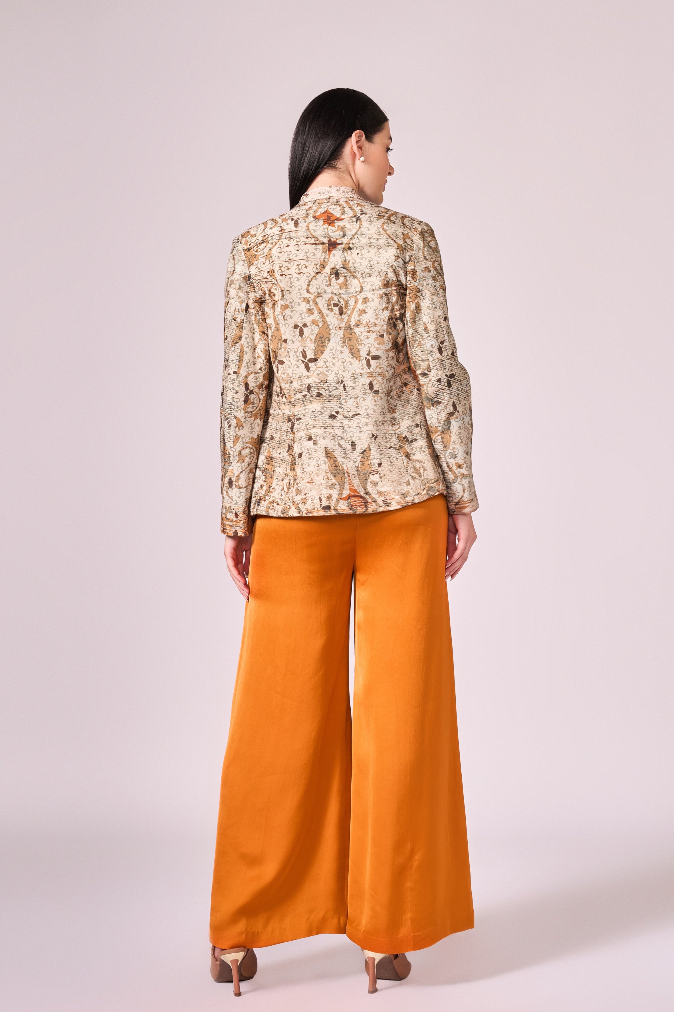 Browns abstract floral print jacket, burnt orange bustier and pant set