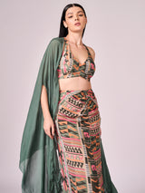 Chalk green cape, multi coloured geometric print blouse and skirt set